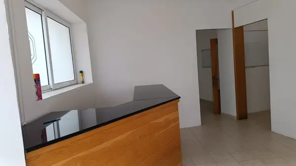 Qawra Rental Opportunity: Shop/Office with Front Patio, Elevated Ground Floor